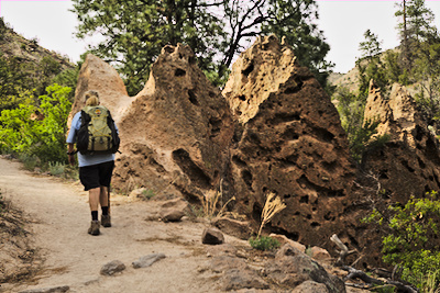 Diana on the trail near some tent rocks
