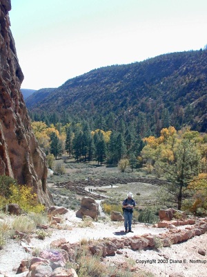 Kenneth Ingham with the Tyuonyi ruins in the background on the Frey trail
